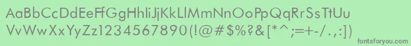 FuturaBookNormal-fontti – harmaat kirjasimet vihreällä taustalla