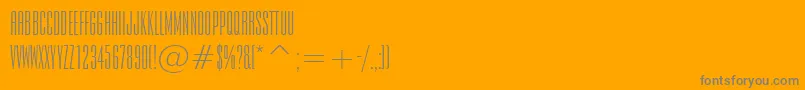 EmpireBt-fontti – harmaat kirjasimet oranssilla taustalla