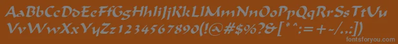 IgnaciousItalic-fontti – harmaat kirjasimet ruskealla taustalla