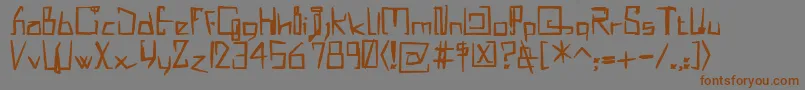 フォントMisqotHeavy – 茶色の文字が灰色の背景にあります。