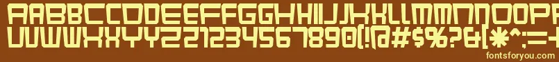 KarnivoreKluster-fontti – keltaiset fontit ruskealla taustalla