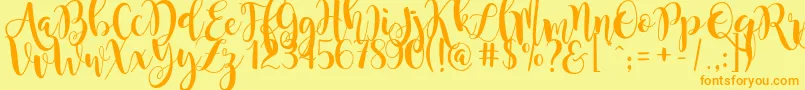 MagnoliaSky-fontti – oranssit fontit keltaisella taustalla