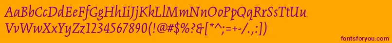 KinesisstdItalic-Schriftart – Violette Schriften auf orangefarbenem Hintergrund