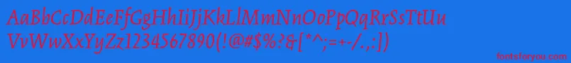 KinesisstdItalic-fontti – punaiset fontit sinisellä taustalla