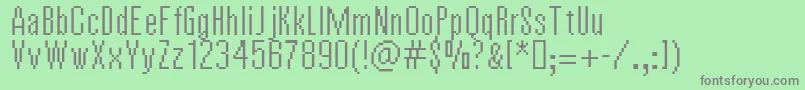 VierzehnPlain14px-fontti – harmaat kirjasimet vihreällä taustalla