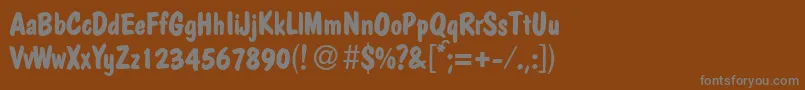 PolcasualBold Font – Gray Fonts on Brown Background