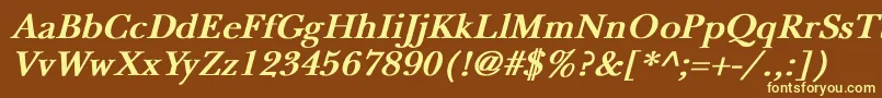 NewbaskervilleBoldItalic-fontti – keltaiset fontit ruskealla taustalla