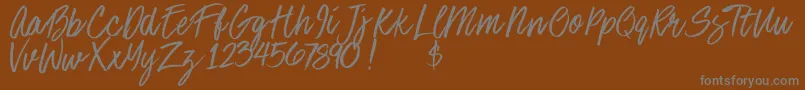 Stoneheartsdemo-Schriftart – Graue Schriften auf braunem Hintergrund