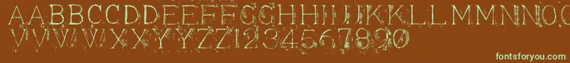 フォントAppendi3 – 緑色の文字が茶色の背景にあります。