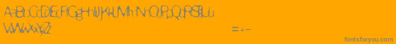 Enervate-Schriftart – Graue Schriften auf orangefarbenem Hintergrund