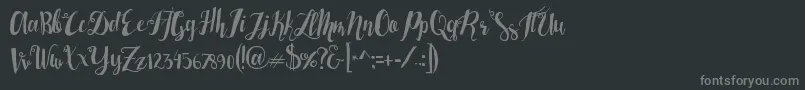 フォントLasermetal – 黒い背景に灰色の文字