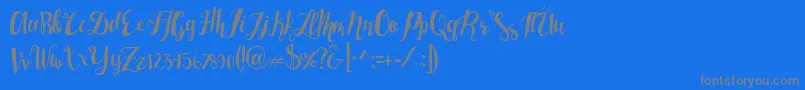 フォントLasermetal – 青い背景に灰色の文字