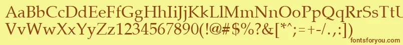 フォントPalisadeRegular – 茶色の文字が黄色の背景にあります。