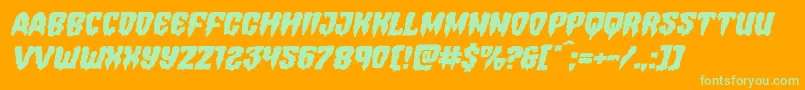 フォントHemogoblinexpandital – オレンジの背景に緑のフォント