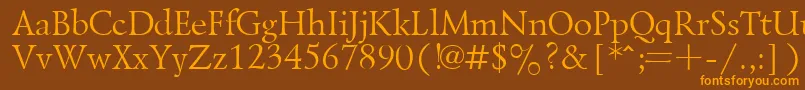 フォントLazurskyPlain.001.001 – オレンジ色の文字が茶色の背景にあります。