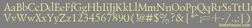フォントLazurskyPlain.001.001 – 黄色のフォント、灰色の背景