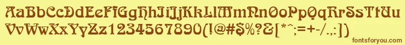 QtarniebRegular Font – Brown Fonts on Yellow Background