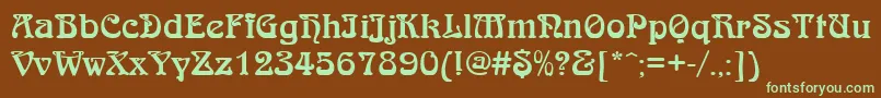 フォントQtarniebRegular – 緑色の文字が茶色の背景にあります。