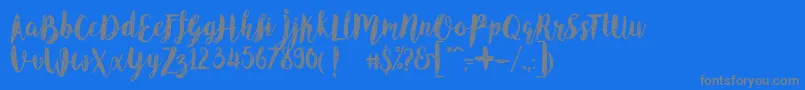 Шрифт AngelineVintageDemo – серые шрифты на синем фоне