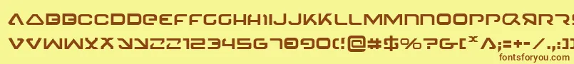 フォント4114Blaster – 茶色の文字が黄色の背景にあります。