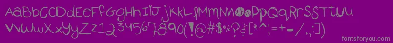 Czcionka AhTheMonsterIsComing – szare czcionki na fioletowym tle
