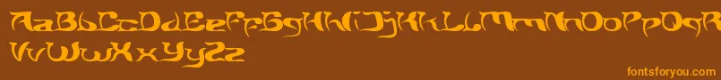 フォントBrainStorm – オレンジ色の文字が茶色の背景にあります。