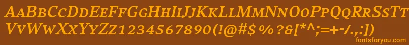 フォントCompatilExquisitLtComBoldItalicSmallCaps – オレンジ色の文字が茶色の背景にあります。