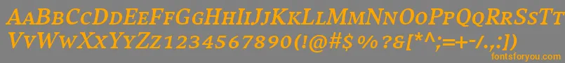 Шрифт CompatilExquisitLtComBoldItalicSmallCaps – оранжевые шрифты на сером фоне