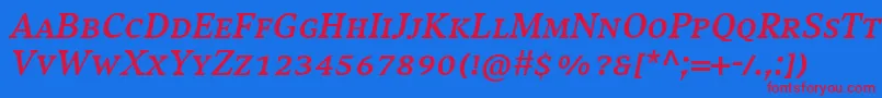 CompatilExquisitLtComBoldItalicSmallCaps-Schriftart – Rote Schriften auf blauem Hintergrund