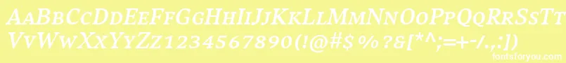 CompatilExquisitLtComBoldItalicSmallCaps-fontti – valkoiset fontit keltaisella taustalla