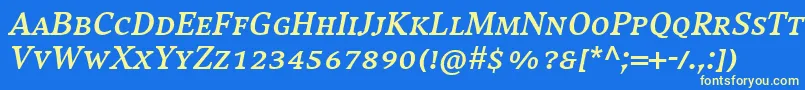 CompatilExquisitLtComBoldItalicSmallCaps-fontti – keltaiset fontit sinisellä taustalla