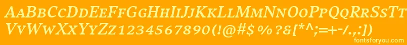 CompatilExquisitLtComBoldItalicSmallCaps-fontti – keltaiset fontit oranssilla taustalla