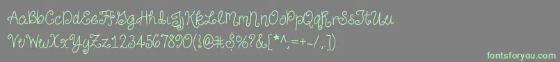 JustForGiggles Font – Green Fonts on Gray Background