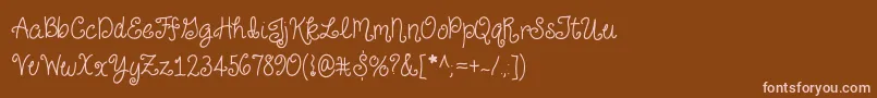 JustForGiggles Font – Pink Fonts on Brown Background