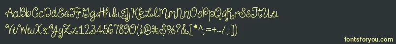 JustForGiggles Font – Yellow Fonts on Black Background