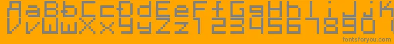 Fonte Megaten20xx – fontes cinzas em um fundo laranja