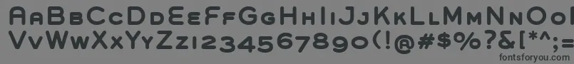 フォントGroverCapsBold – 黒い文字の灰色の背景