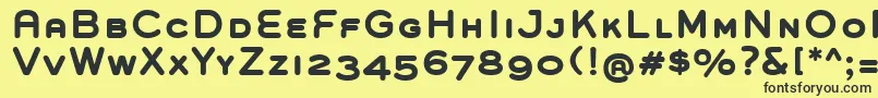 GroverCapsBold-fontti – mustat fontit keltaisella taustalla