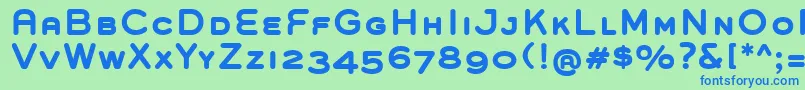 GroverCapsBold-fontti – siniset fontit vihreällä taustalla