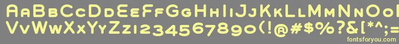 GroverCapsBold-fontti – keltaiset fontit harmaalla taustalla