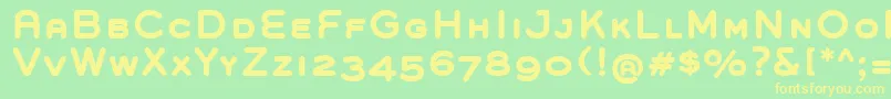 GroverCapsBold-Schriftart – Gelbe Schriften auf grünem Hintergrund
