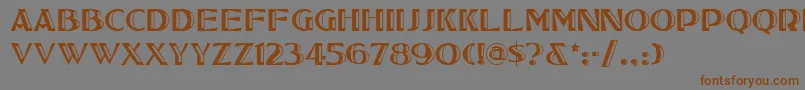 フォントTucsonone – 茶色の文字が灰色の背景にあります。