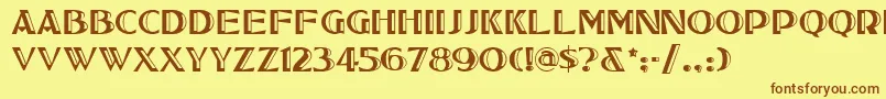 フォントTucsonone – 茶色の文字が黄色の背景にあります。