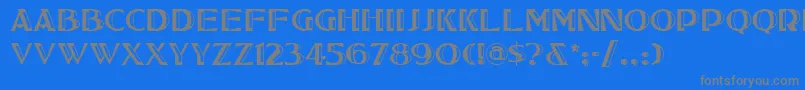 フォントTucsonone – 青い背景に灰色の文字