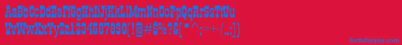 GildiaRegular-Schriftart – Blaue Schriften auf rotem Hintergrund