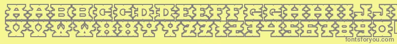Montezuma Font – Gray Fonts on Yellow Background