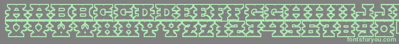 Montezuma Font – Green Fonts on Gray Background