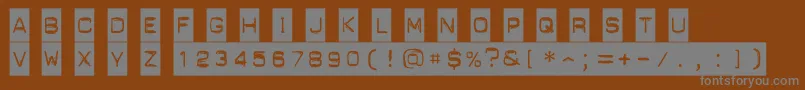Weitere Informationen zur PunchLabel-Schriftart PunchLabel-Schriftart – Graue Schriften auf braunem Hintergrund