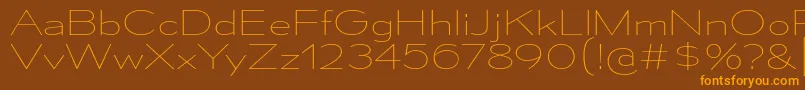 MesmerizeExUl Font – Orange Fonts on Brown Background