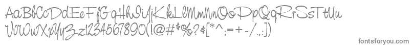 フォントStCursiveHand – 白い背景に灰色の文字